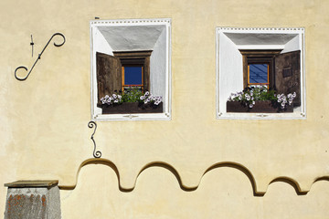 The ancient traditional window. Zuoz, Switzerland - 97043616