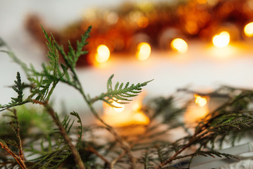 green branches of cedar or fir and amazing beautiful christmas g