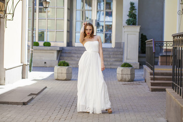 Full length portrait of beautiful model woman with long legs wea