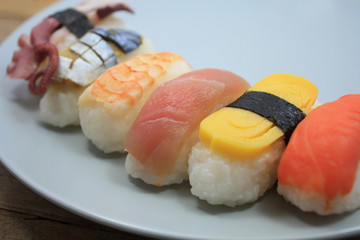Maki Sushi set on wooden background