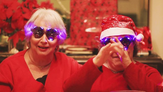 SENIOR LADIES HAVING FUN FOR CHRISTMAS