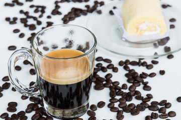 Espresso shot and soft roll cake.