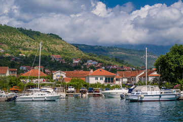 Fototapeta na wymiar Small yacht marina vith sailing boats landscape