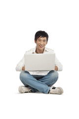 Young man using a laptop computer