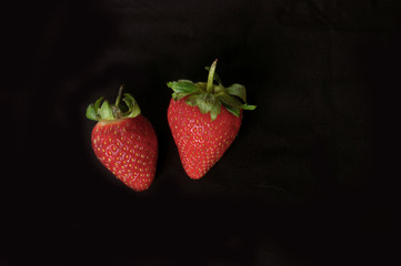 Isolated raspberry on black background