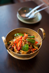 Stir fried chicken with Thai herbs.