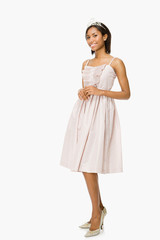 Naklejka premium Young woman in prom dress