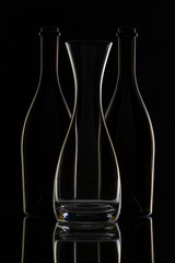 Empty glass and bottles