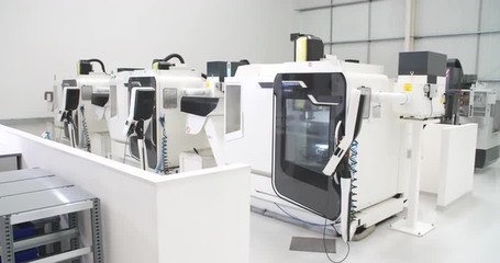 View Of Empty Engineering Workshop With CNC Machines