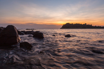 Beautiful HDR sunset over sea beach