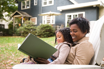 Mother and daughter with book