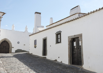 street in miradoura with old houses