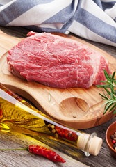 Raw beef steak and spices