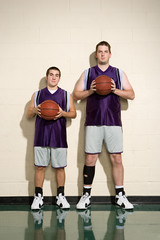 Tall and short basketball players