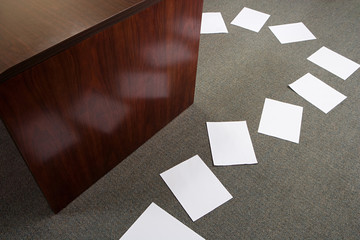 Paper on office floor