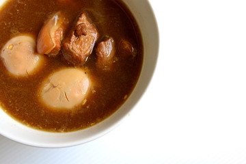 Eggs and pork in brown sauce