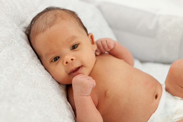 Beautiful Baby one month smiling