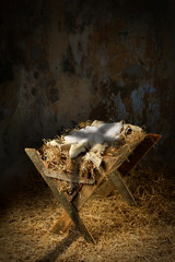 Empty Manger With Cross Shadow