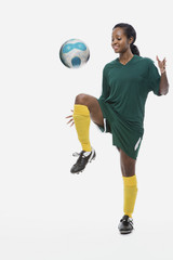 Footballer playing keepy uppy © xixinxing