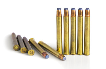 large rifle bullets on white background