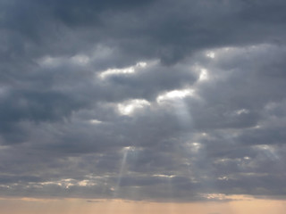 Sky with giants cumulonimbus clouds and sun rays through