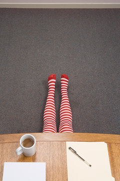 Office Worker Hiding Under Desk