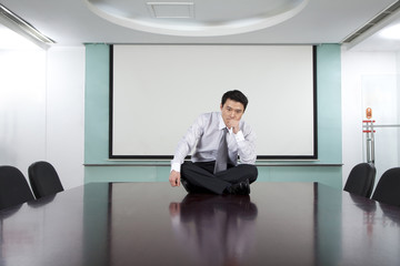 Businessman in Conference Room