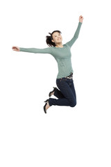 Fototapeta na wymiar Portrait of an excited young woman mid-air