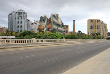 Fototapeta na wymiar VALENCIA, SPAIN - AUGUST 26, 2012: Statues of the gargoyles on Puente del Reino