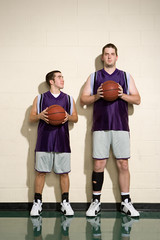 Tall and short basketball players