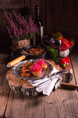 ratatouille with baked potato and beetroot sprouts
