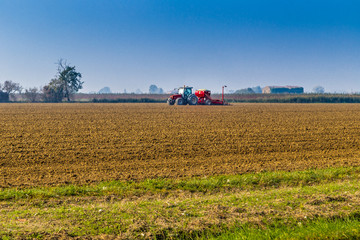 tractor plowing a field