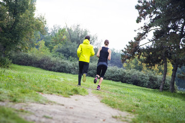 Young people running in the park