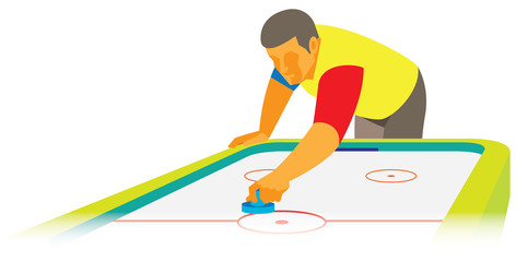 Young man is air hockey player