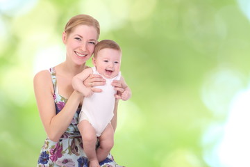 happy mother holding her baby