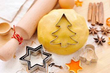 Baking homemade Gingerbread cookies with a shape of a christmas tree