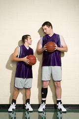 Tall and short basketball players