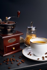 Coffee grinder and cup 