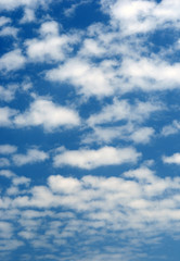 white clouds on blue sky