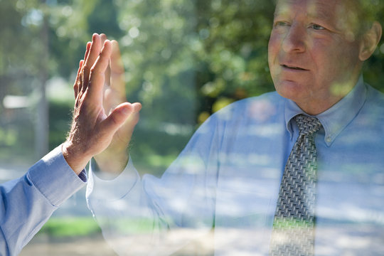 Man looking at his reflection