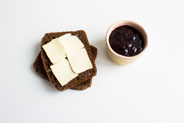Breakfast: brown bread with butter and currant jam