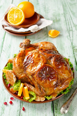 Whole roasted chicken with oranges
