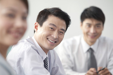 Businessman Smiling At Camera