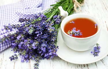 Cup of tea and lavender flowers