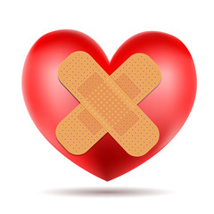 heart symbol with adhesive bandage on white