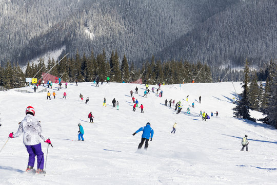 Skiers and snowboarders enjoying good snow