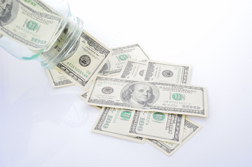 dollar bills fall out of banks