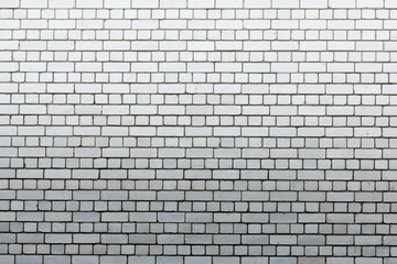 Abstract texture light gray and aged brick wall background
