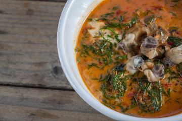 Thai food: Piper sarmentosum leaves snail Curry