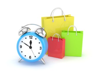 alarm clock and shopping bag (time to buy concept)